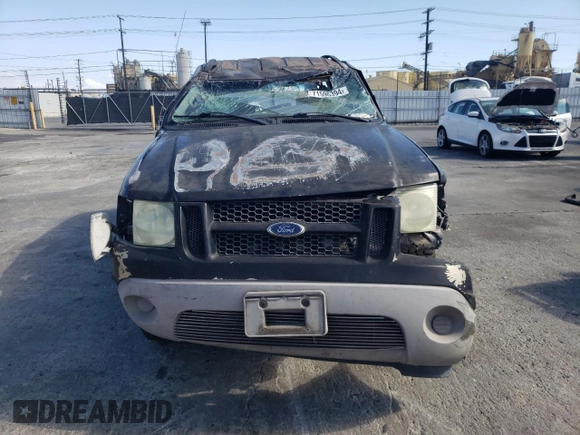 2003 Ford Explorer Sport XLS z VIN 1FMYU60E93UC12832, wystawiony jako Copart lot #71596394 z przebiegiem 197 215 mil mil oraz Szkody całkowita. Historia ofert i sprzedaży dostępna na DreamBid. Obrazek 5.