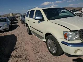 2009 Chrysler Aspen Limited z VIN 1A8HW58T49F703794, wystawiony jako Copart lot #75847254 z przebiegiem 224 535 mil mil oraz Szkoda całkowita • Salvage title. Historia ofert i sprzedaży dostępna na DreamBid. Obrazek 12.