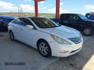 2012 Hyundai Sonata Limited z VIN 5NPEC4AC5CH389030, wystawiony jako IAAI lot #42260930 z przebiegiem 172 476 mil mil oraz . Historia ofert i sprzedaży dostępna na DreamBid. Obrazek 1.