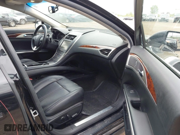 2016 Lincoln MKZ with VIN 3LN6L2G99GR601799, listed as a IAAI auction lot 42350755 with 106,144 mi miles and . Bid and sale history available at DreamBid. Image 5.