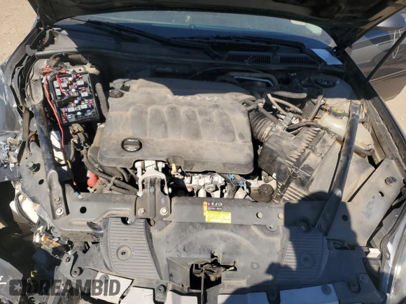 2016 Chevrolet Impala LS with VIN 2G1WA5E32G1111728, listed as a Copart auction lot 76654464 with 83,299 mi miles and Salvage title. Bid and sale history available at DreamBid. Image 12.
