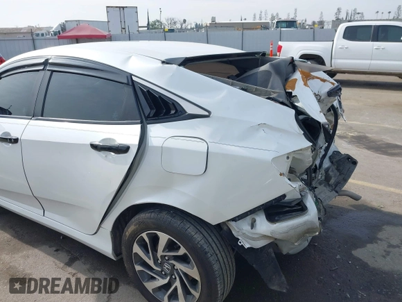 2016 Honda Civic EX with VIN 19XFC2F72GE097060, listed as a IAAI auction lot 41626940 with 156,941 mi miles and . Bid and sale history available at DreamBid. Image 19.