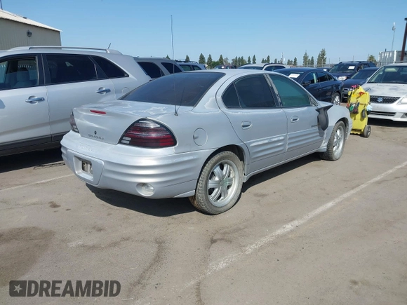1999 Pontiac Grand Am SE with VIN 1G2NE52TXXC553246, listed as a IAAI auction lot 42398103 with Not provided miles and . Bid and sale history available at DreamBid. Image 4.