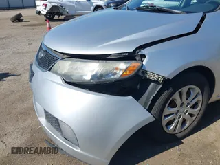 2010 Kia Forte EX with VIN KNAFU4A2XA5097831, listed as a IAAI auction lot 41872156 with 168,081 mi miles. Bid and sale history available at carsss.com. Image 17.