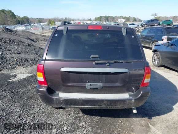 2004 Jeep Grand Cherokee with VIN 1J8GX48S24C266933, listed as a IAAI auction lot 41497122 with 200,899 mi miles and . Bid and sale history available at DreamBid. Image 17.