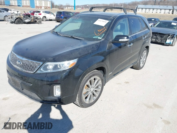 2015 Kia Sorento SX with VIN 5XYKWDA70FG565779, listed as a IAAI auction lot 41675010 with 134,060 mi miles. Bid and sale history available at carsss.com. Image 2.