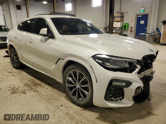 2020 BMW X6 xDrive40i z VIN 5UXCY6C07L9B43453, wystawiony jako Copart lot #52096845 z przebiegiem Nie podano mil oraz Szkoda całkowita • Salvage title. Historia ofert i sprzedaży dostępna na DreamBid. Obrazek 4.