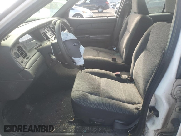 2005 Ford Police Interceptor with VIN 2FAHP71W55X174056, listed as a Copart auction lot 55501955 with 330,613 mi miles and Salvage title. Bid and sale history available at DreamBid. Image 7.