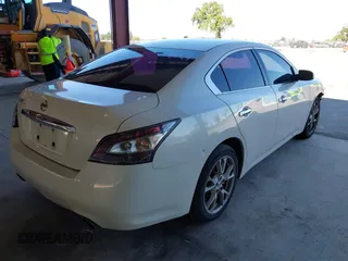 2014 Nissan Maxima SV z VIN 1N4AA5AP5EC482907, wystawiony jako IAAI lot #41885801 z przebiegiem 186 364 mil mil oraz . Historia ofert i sprzedaży dostępna na DreamBid. Obrazek 4.