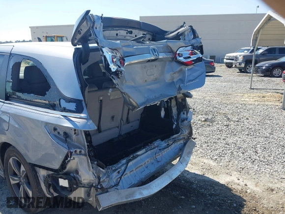 2018 Honda Odyssey Touring with VIN 5FNRL6H84JB070387, listed as a IAAI auction lot 41835852 with 98,662 mi miles. Bid and sale history available at carsss.com. Image 6.