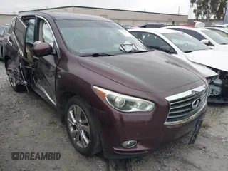 2015 Infiniti QX60 with VIN 5N1AL0MM3FC502870, listed as a IAAI auction lot 41734954 with 117,455 mi miles. Bid and sale history available at carsss.com. Image 1.