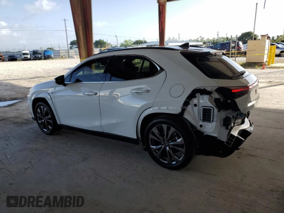 2023 Lexus UX 250h F Sport с VIN JTHR6JBH2P2150820, выставлен на аукционе Copart как лот 77956114 с пробегом 9 422 миль миль и Списание • Salvage title. История ставок и продаж доступна на DreamBid. Изображение 2.