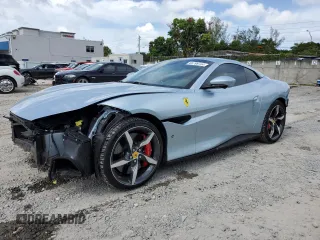 2023 Ferrari Portofino z VIN ZFF02RPA4P0298111, wystawiony jako Copart lot #65799704 z przebiegiem 1096 mil mil oraz Nie do naprawy. Historia ofert i sprzedaży dostępna na DreamBid. Obrazek 1.