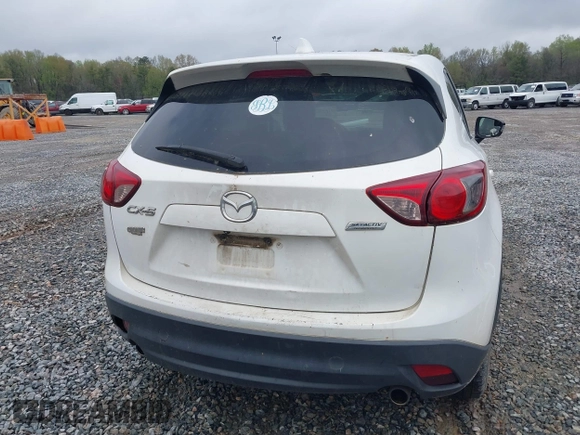 2015 Mazda CX-5 Touring with VIN JM3KE2CY4F0436664, listed as a IAAI auction lot 41876238 with 374,305 mi miles. Bid and sale history available at carsss.com. Image 16.