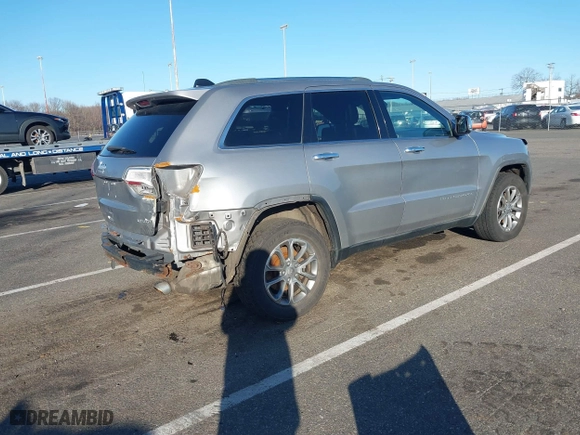 2014 Jeep Grand Cherokee Limited with VIN 1C4RJFBG1EC219721, listed as a IAAI auction lot 41754606 with 146,732 mi miles. Bid and sale history available at carsss.com. Image 4.