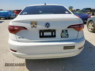 2019 Volkswagen Jetta S with VIN 3VWC57BU7KM064315, listed as a Copart auction lot 57457975 with 129,596 mi miles and Salvage title. Bid and sale history available at DreamBid. Image 6.