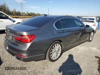 2016 BMW 7 Series 740i с VIN WBA7E2C51GG503912, выставлен на аукционе Copart как лот 47464895 с пробегом 160 322 миль миль и Списание • Salvage title. История ставок и продаж доступна на DreamBid. Изображение 3.