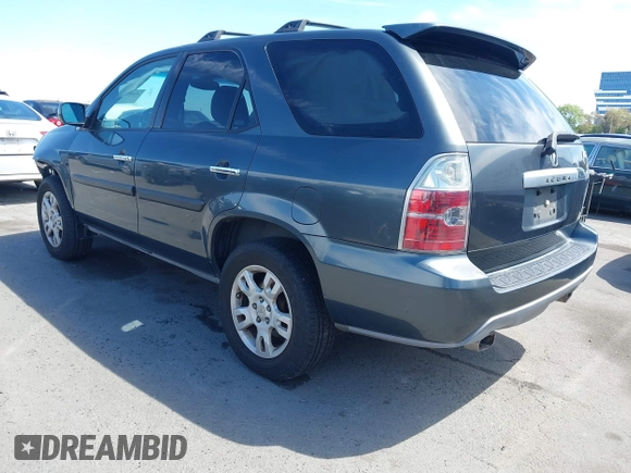 2004 Acura MDX Touring Pkg w/Navigation with VIN 2HNYD18834H517618, listed as a IAAI auction lot 42003807 with 186,555 mi miles. Bid and sale history available at carsss.com. Image 3.
