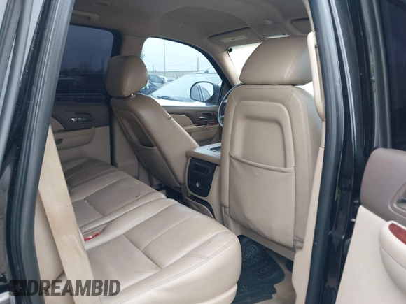 2014 GMC Yukon SLT with VIN 1GKS1CE02ER207447, listed as a IAAI auction lot 41604134 with 199,417 mi miles. Bid and sale history available at carsss.com. Image 8.