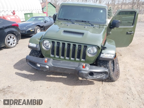 2023 Jeep Gladiator Mojave with VIN 1C6JJTEG6PL564504, listed as a IAAI auction lot 41752685 with 20,430 mi miles and . Bid and sale history available at DreamBid. Image 6.