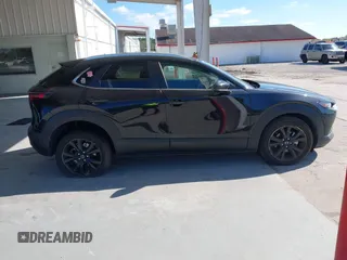 2022 Mazda CX-30 2.5 Turbo with VIN 3MVDMBAY3NM440688, listed as a IAAI auction lot 40860258 with 27,445 mi miles and . Bid and sale history available at DreamBid. Image 13.