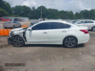 2016 Nissan Altima SR with VIN 1N4AL3AP7GC219688, listed as a IAAI auction lot 42267866 with 110,786 mi miles and . Bid and sale history available at DreamBid. Image 14.