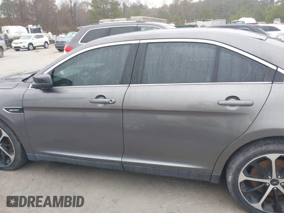 2014 Ford Taurus SHO with VIN 1FAHP2KT0EG171336, listed as a IAAI auction lot 41566688 with 154,328 mi miles. Bid and sale history available at carsss.com. Image 14.