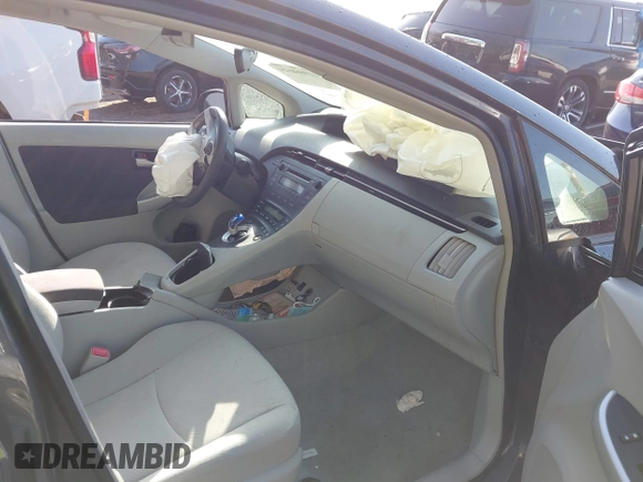 2011 Toyota Prius I with VIN JTDKN3DU4B1377629, listed as a IAAI auction lot 41994624 with 120,950 mi miles and . Bid and sale history available at DreamBid. Image 5.