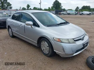 2007 Honda Civic z VIN JHMFA362X7S032498, wystawiony jako IAAI lot #42125472 z przebiegiem 150 854 mil mil oraz . Historia ofert i sprzedaży dostępna na DreamBid. Obrazek 1.
