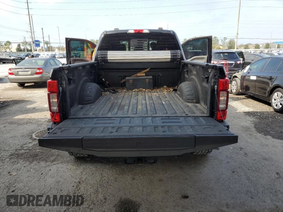 2021 Ford Super Duty F-250 SRW XL with VIN 1FT7W2BT1MEC51277, listed as a Copart auction lot 43544475 with 99,324 mi miles and Salvage Title. Bid and sale history available at carsss.com. Image 6.