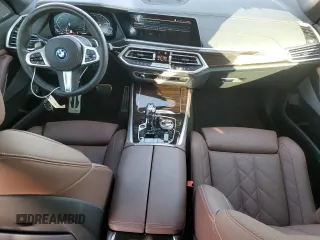 2023 BMW X5 xDrive45e with VIN 5UXTA6C00P9N69315, listed as a Copart auction lot 44711865 with 11,802 mi miles and Salvage Title. Bid and sale history available at carsss.com. Image 8.