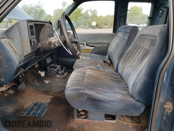 1991 GMC Sierra 1500 with VIN 2GTEC19H2M1540763, listed as a Copart auction lot 70480694 with 379,189 mi miles and Salvage Title. Bid and sale history available at DreamBid. Image 7.