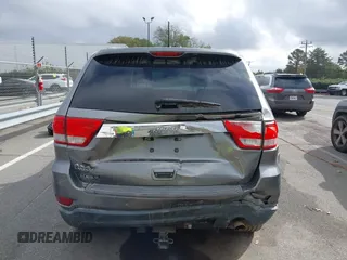 2012 Jeep Grand Cherokee Laredo with VIN 1C4RJFAG8CC298268, listed as a IAAI auction lot 40787833 with 206,486 mi miles. Bid and sale history available at carsss.com. Image 15.