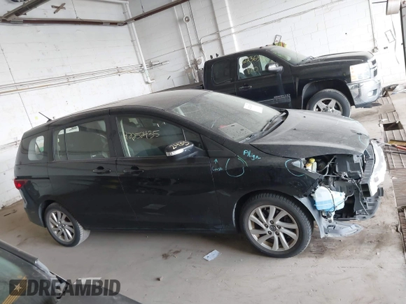 2013 Mazda 5 Sport z VIN JM1CW2BL6D0154104, wystawiony jako IAAI lot #42252435 z przebiegiem 133 413 mil mil oraz . Historia ofert i sprzedaży dostępna na DreamBid. Obrazek 14.
