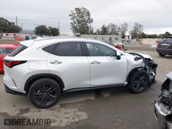 2025 Lexus NX 450h+ Luxury z VIN JTJHKCFZ1S2043125, wystawiony jako IAAI lot #42062361 z przebiegiem 24 902 mil mil oraz . Historia ofert i sprzedaży dostępna na DreamBid. Obrazek 13.