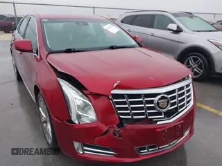 2013 Cadillac XTS Luxury with VIN 2G61P5S32D9115640, listed as a IAAI auction lot 41065284 with 125,643 mi miles and . Bid and sale history available at carsss.com. Image 6.