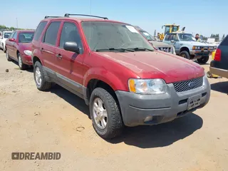 2003 Ford Escape XLT Popular 2 with VIN 1FMCU93173KC27250, listed as a IAAI auction lot 42702510 with 119,262 mi miles and . Bid and sale history available at DreamBid. Image 1.