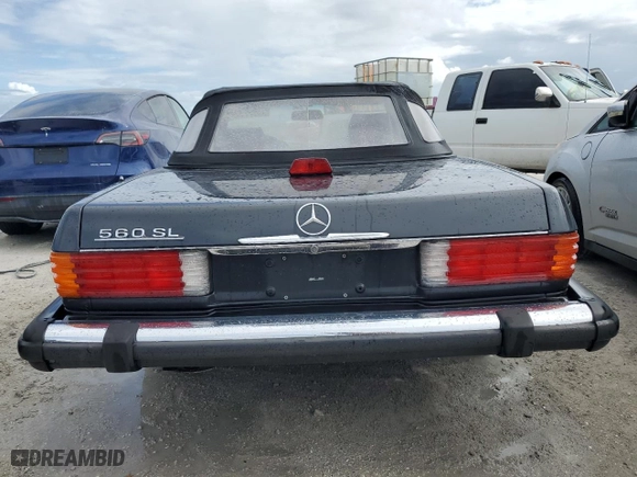 1987 Mercedes-Benz 560 Series 560SL with VIN WDBBA48D9HA060044, listed as a Copart auction lot 76965694 with NaN miles and Non Repairable. Bid and sale history available at carsss.com. Image 6.