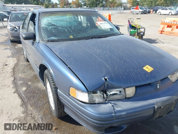 1997 Oldsmobile Cutlass Supreme S z VIN 1G3WH52M3VF338576, wystawiony jako IAAI lot #40573770 z przebiegiem 105 806 mil mil oraz . Historia ofert i sprzedaży dostępna na DreamBid. Obrazek 6.