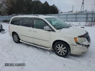 2009 Chrysler Town & Country Touring with VIN 2A8HR54X39R703438, listed as a Copart auction lot 86143644 with 254,748 mi miles and Clean Title. Bid and sale history available at DreamBid. Image 4.