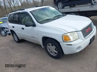 2002 GMC Envoy SLT with VIN 1GKDS13S222403729, listed as a IAAI auction lot 41893755 with 169,948 mi miles. Bid and sale history available at carsss.com. Image 1.