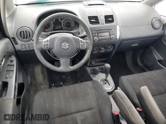 2011 Suzuki SX4 with VIN JS2YC5A44B6300171, listed as a Copart auction lot 87673685 with 116,483 mi miles and Salvage Title. Bid and sale history available at DreamBid. Image 8.
