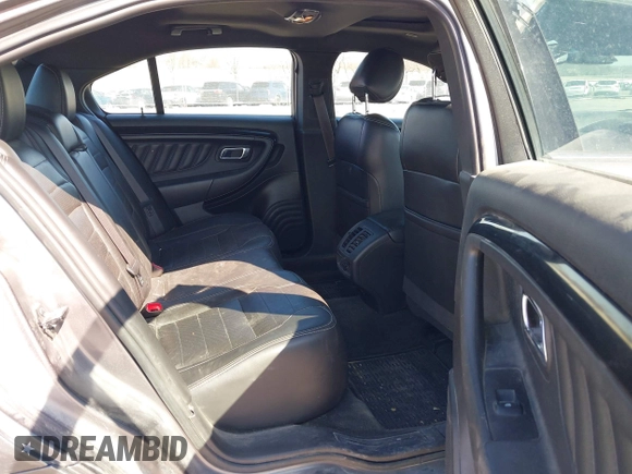 2013 Ford Taurus SHO с VIN 1FAHP2KT0DG220825, выставлен на аукционе IAAI как лот 41851095 с пробегом 163 797 миль миль и . История ставок и продаж доступна на DreamBid. Изображение 8.