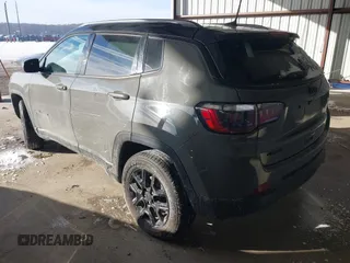 2021 Jeep Compass Sport with VIN 3C4NJDAB2MT591242, listed as a IAAI auction lot 41397874 with 64,653 mi miles and . Bid and sale history available at DreamBid. Image 3.