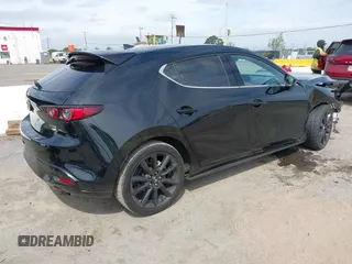2021 Mazda 3 Premium Plus z VIN JM1BPBNY2M1403797, wystawiony jako IAAI lot #42031637 z przebiegiem Nie podano mil oraz . Historia ofert i sprzedaży dostępna na DreamBid. Obrazek 4.