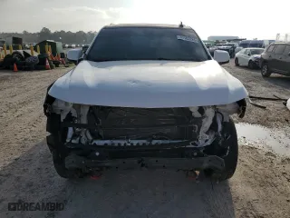 2021 Chevrolet Tahoe Z71 with VIN 1GNSKPKD3MR117317, listed as a Copart auction lot 49102285 with 130,976 mi miles and Salvage Title. Bid and sale history available at carsss.com. Image 5.
