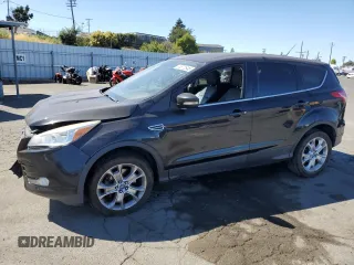2013 Ford Escape SEL z VIN 1FMCU9H94DUC94456, wystawiony jako Copart lot #63872645 z przebiegiem 177 099 mil mil oraz Szkoda całkowita • Salvage title. Historia ofert i sprzedaży dostępna na DreamBid. Obrazek 1.