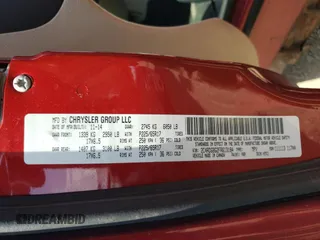 2015 Dodge Grand Caravan SE with VIN 2C4RDGBG2FR613184, listed as a Copart auction lot 67111284 with 249,959 mi miles and Salvage Title. Bid and sale history available at DreamBid. Image 13.