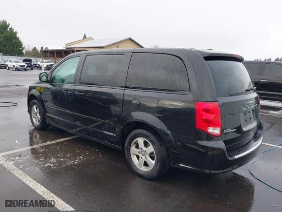 2011 Dodge Grand Caravan Mainstreet with VIN 2D4RN3DG1BR731727, listed as a IAAI auction lot 41820862 with 165,667 mi miles. Bid and sale history available at carsss.com. Image 3.