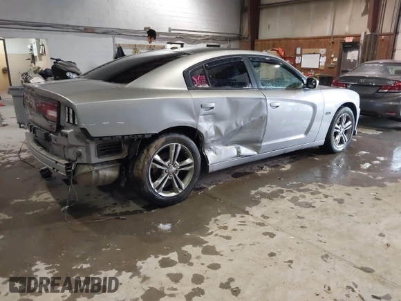 2014 Dodge Charger RT Plus with VIN 2C3CDXDT7EH159703, listed as a IAAI auction lot 41247393 with 132,332 mi miles. Bid and sale history available at carsss.com. Image 4.